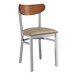 A Lancaster Table & Seating Boomerang chair with a taupe cushion and wood back.
