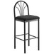 A Lancaster Table & Seating black bar stool with black fabric seat.
