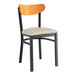 A black Lancaster Table & Seating chair with a light gray seat and cherry wood back.