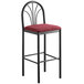 A Lancaster Table & Seating black bar stool with a merlot fabric seat.