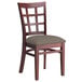 A Lancaster Table & Seating mahogany wood chair with taupe vinyl seat