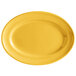A yellow oval platter with a white background.