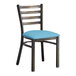 A Lancaster Table & Seating distressed copper metal ladder back chair with a blue vinyl padded seat.