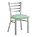 A Lancaster Table & Seating ladder back chair with a seafoam green padded seat.