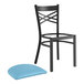 A Lancaster Table & Seating black cross back chair with a blue vinyl padded seat.