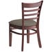 A Lancaster Table & Seating mahogany wood restaurant chair with a taupe vinyl cushion on the seat and ladder back.