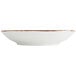 A Fortessa bright white china coupe bowl with a brown rim.