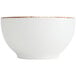 A Fortessa bright white china bowl with brown specks on the rim.