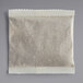 A white square paper bag with a scalloped edge containing Folgers Classic Decaf 4-Cup Coffee Filter Packs.