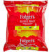 A red Folgers Classic Roast coffee bag.