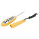 A yellow Taylor digital pocket probe thermometer with a black cord.