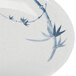 A white melamine plate with blue bamboo design.