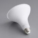 A white Eiko PAR38 LED light bulb on a gray surface.