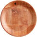 A Choice woven wood plate with a pattern on it.