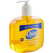 A bottle of Dial Professional Gold antibacterial liquid hand soap with a white cap.