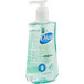 A plastic bottle of Dial Professional Basics Hypoallergenic Liquid Hand Soap with a pump top.