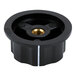 A black round Galaxy control knob with a gold center.