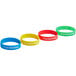 A row of four iSi rubber whipper bands in different colors: blue, green, red, and yellow.