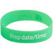A green rubber bracelet with white text that reads "prep date time"