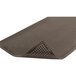 A close up of a black Notrax Bubble Top anti-fatigue mat with a corner.