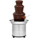A Sephra light-duty chocolate fountain with a strawberry on top.