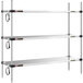 A Metro Super Erecta stainless steel heated shelf with three shelves and chrome posts.