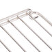A stainless steel Main Street Equipment oven rack with four bars.