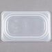 A Cambro translucent plastic lid on a plastic container.