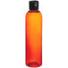 An amber Bullet Cosmo plastic bottle with black flip top lid filled with red liquid.