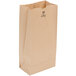 A bundle of Duro brown paper bags.