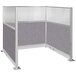 A Versare Hush Panel U-shape cubicle with grey fabric sides.