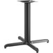 A black Lancaster Table & Seating stamped steel table base with a square column and four legs.