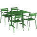 A green table with four green metal arm chairs.