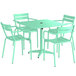 A Lancaster Table and Seating seafoam green table with 4 chairs.