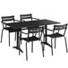 A black Lancaster Table & Seating outdoor dining set with four chairs on a table.