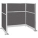 A Versare charcoal gray cubicle with two panels on it.