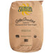 A brown bag of Florida Crystals Organic 10X Powdered Raw Cane Sugar.