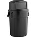 A black Rubbermaid BRUTE trash can with a black round dome lid.