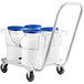 A white cart with white containers with blue lids.