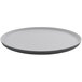 A white oval melamine platter with a black border.