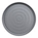 A close-up of a grey GET Roca melamine plate with a circular pattern.