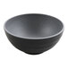 A close up of a black and gray GET Roca melamine ramen bowl.