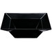A black melamine bowl with a black triangular design.