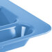 A close-up of a blue Cambro 6 compartment tray.