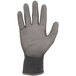 A gray Ergodyne ProFlex warehouse glove with a black polyurethane palm coating.
