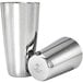 A close-up of a silver Barfly cocktail shaker with two stainless steel tumblers with lids.