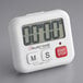 An AvaTime digital kitchen timer with a digital display and red buttons.