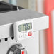 An AvaTime Digital Kitchen Timer on a counter.