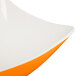 A close up of a white and orange GET Keywest sunset flare melamine bowl.