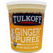 A white container of Tulkoff ginger puree with an orange label.